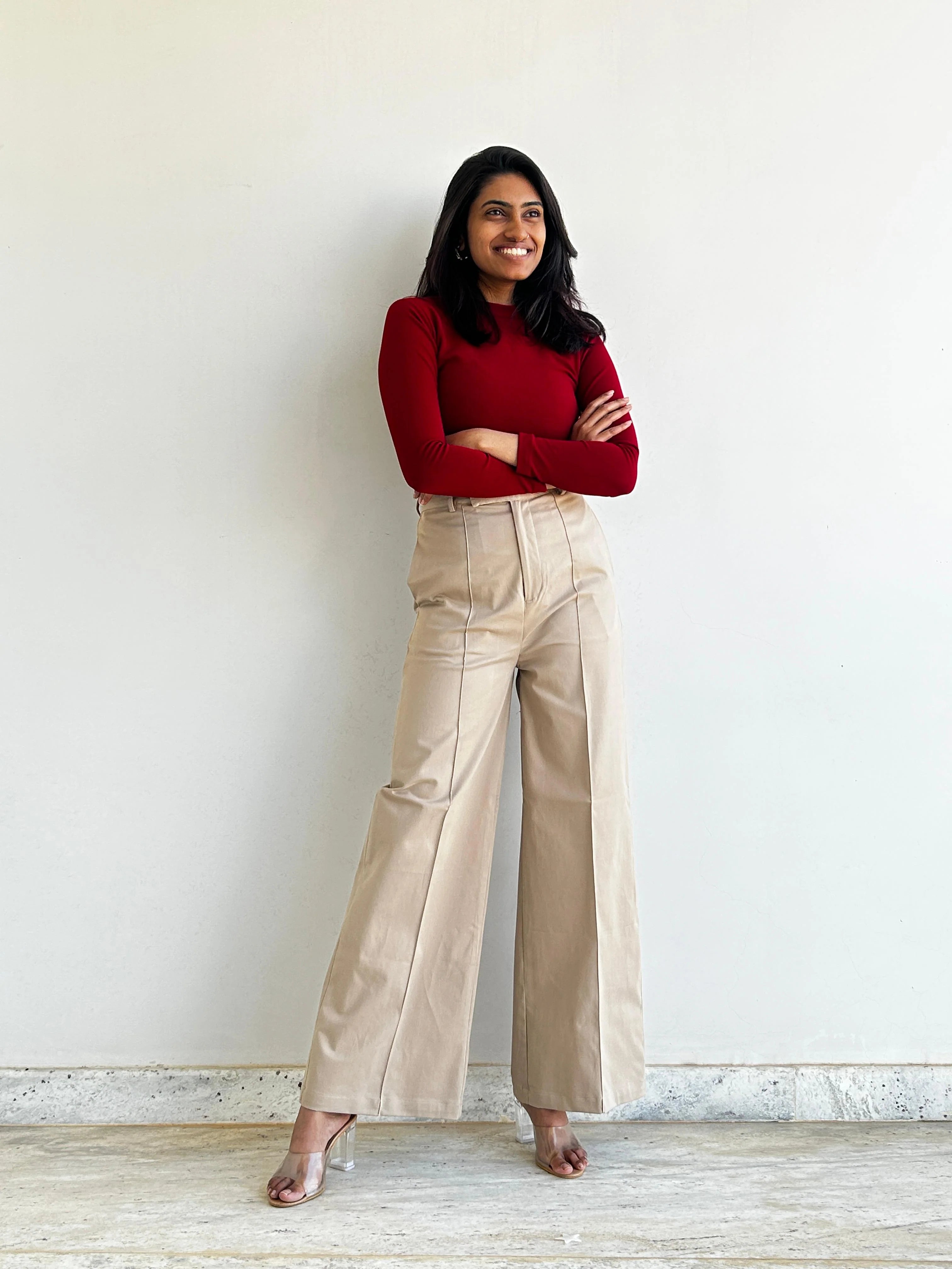 A woman wearing beige wide leg high rise formal trouser | beige office pant | Asqeu